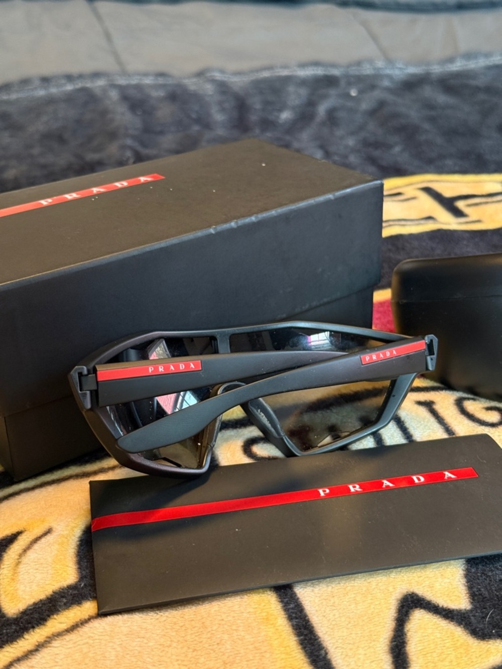 Prada Black Sunglasses with Purple Mirrored Lenses - Picture 2 of 4